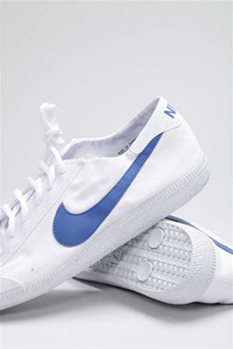 nike white blue tan sneakers.